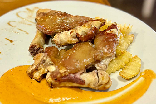 Solomillo de ternera Manitas de cerdo a la brasa